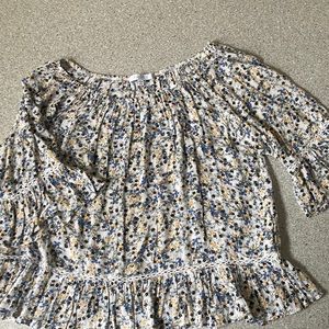 Fever floral peasant top 1/2length sleeves. Cream W/blue, yellow & black.